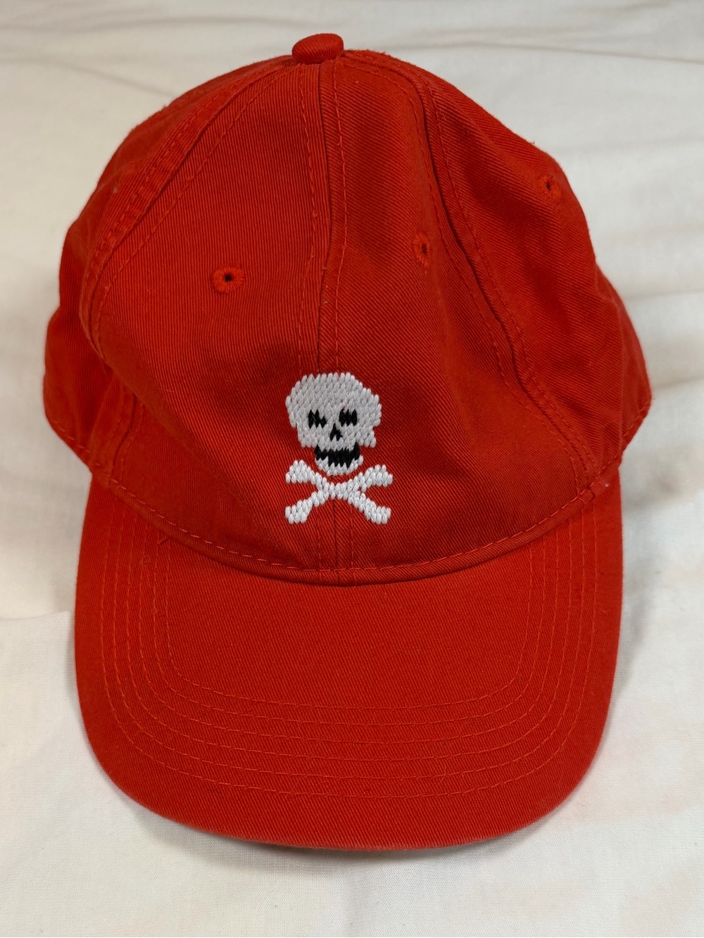 Red Baseball Cap with White Skull & Crossbones Embroidery